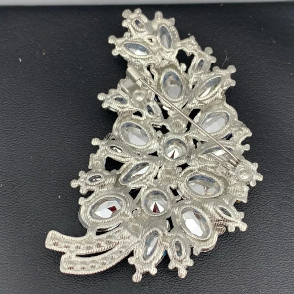 Silver tone and Large blue rhinestone brooch